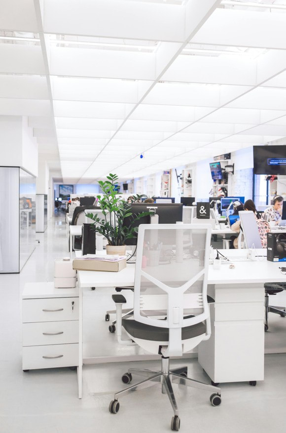 Bright office with workstations